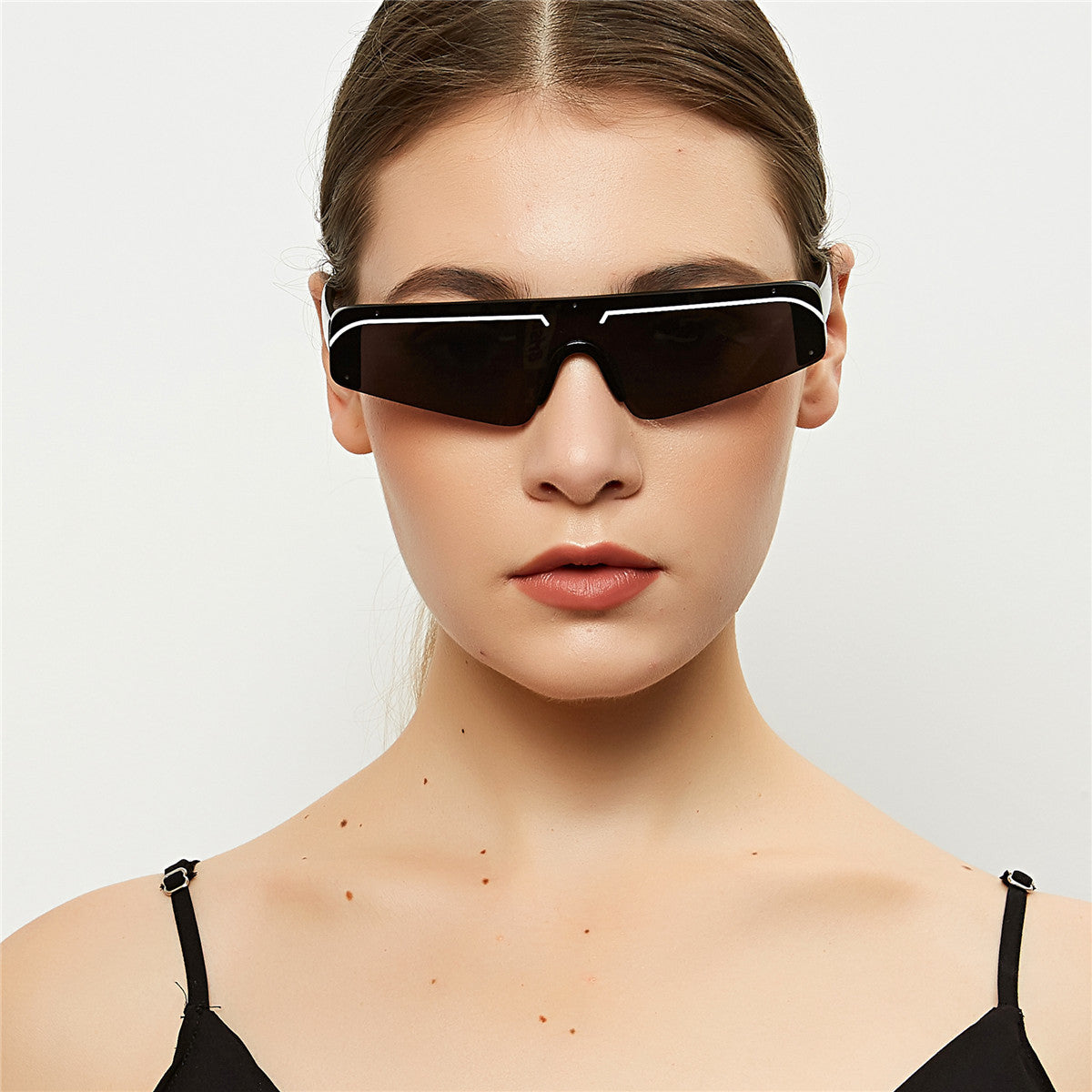 Rimless women's sunglasses with powder film