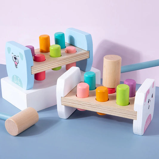 Wooden Colorful Pounding Toy Features assorted colorful pegs and a wooden hammer Kids have a blast hammering away