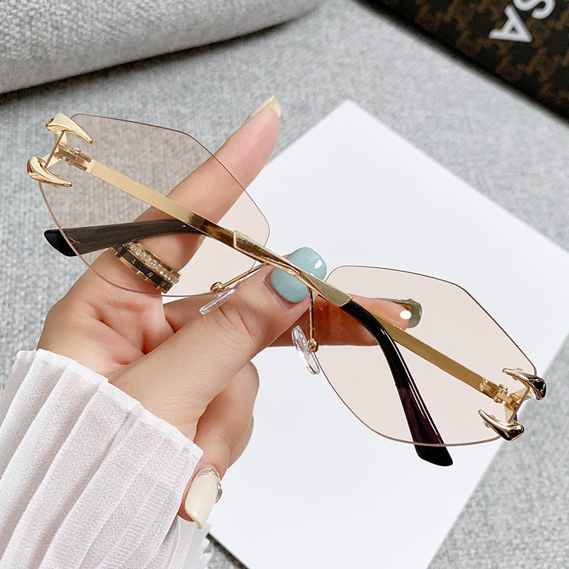 Frameless Grapple Polygonal Sunglasses Hip Hop Trend